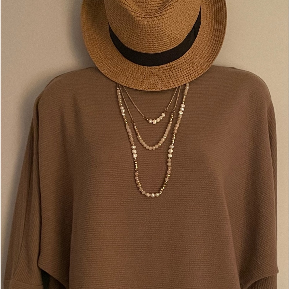 NWT Soft comfortable Chenault top. Great style with flattering narrow sleeves.